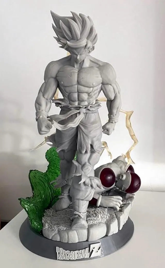Statue of a muscular character with a smaller figure on a base, featuring 'Dragon Ball Z' branding.