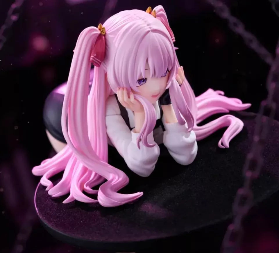 Anime character figurine with pink hair and white outfit on a dark background