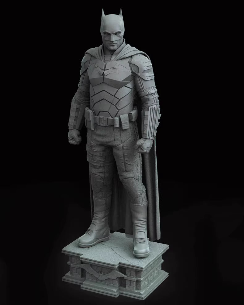 Batman figure in gray on a black background