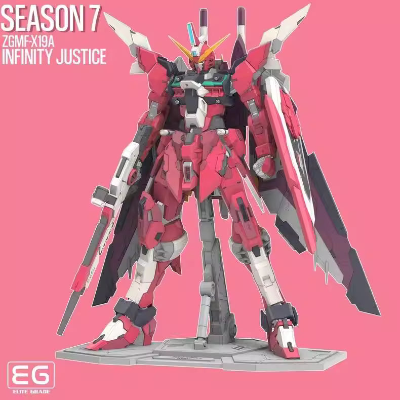 Model kit of a robot with 'Season 7' and 'Infinity Justice' text on a pink background