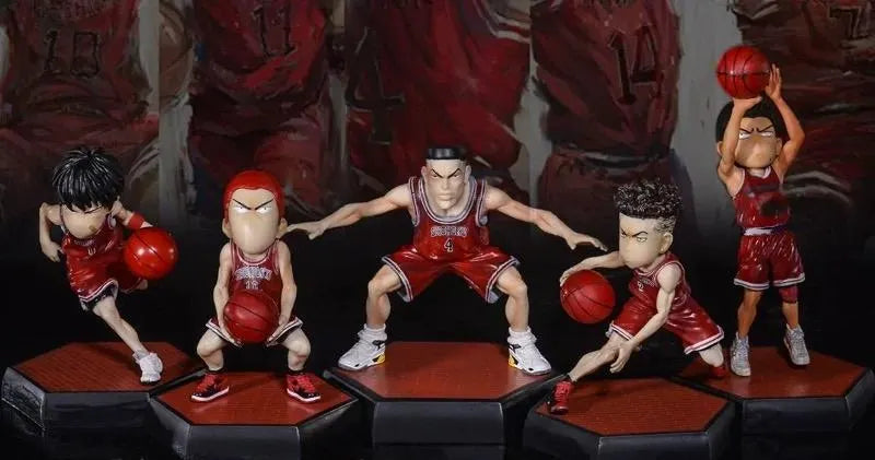 Set of basketball-themed figurines on stands with a dark background