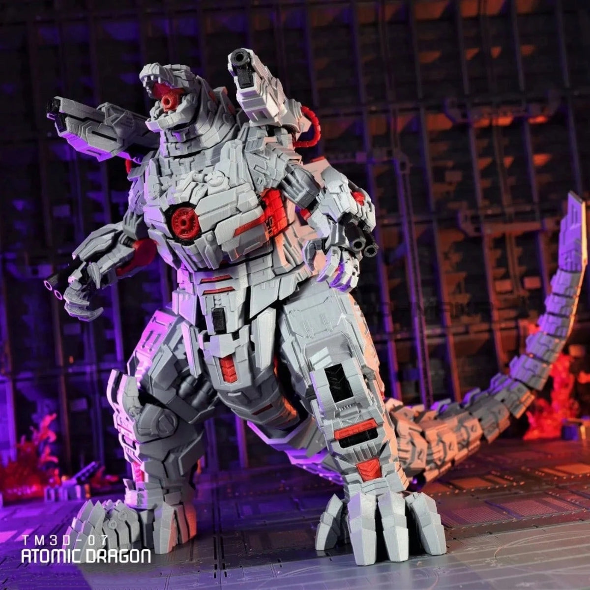 A highly detailed, gray and white robotic dinosaur figure with red accents, posed dynamically in a dark, industrial setting with dramatic purple and red lighting. The figure is identified as an Atomic Dragon toy by the watermark text in the lower-left corner.