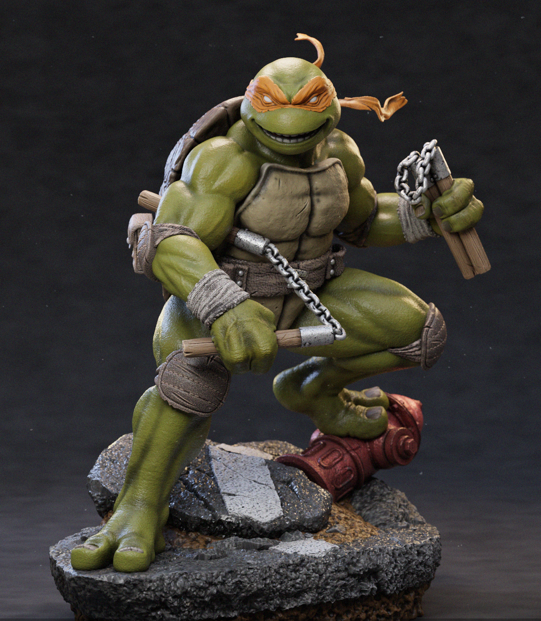 A detailed collectible figurine of Michelangelo from Teenage Mutant Ninja Turtles, posed dynamically on a rocky base against a dark studio background. The figure features his signature green skin, orange mask, brown shell, and gray pants, holding nunchucks in one hand and a chain in the other.