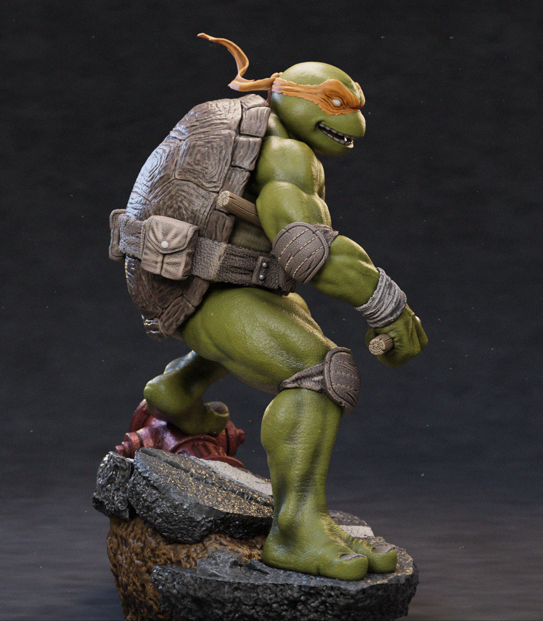 A detailed collectible statue of a green-skinned turtle character in a dynamic crouching pose, standing on a rocky base against a dark studio background.