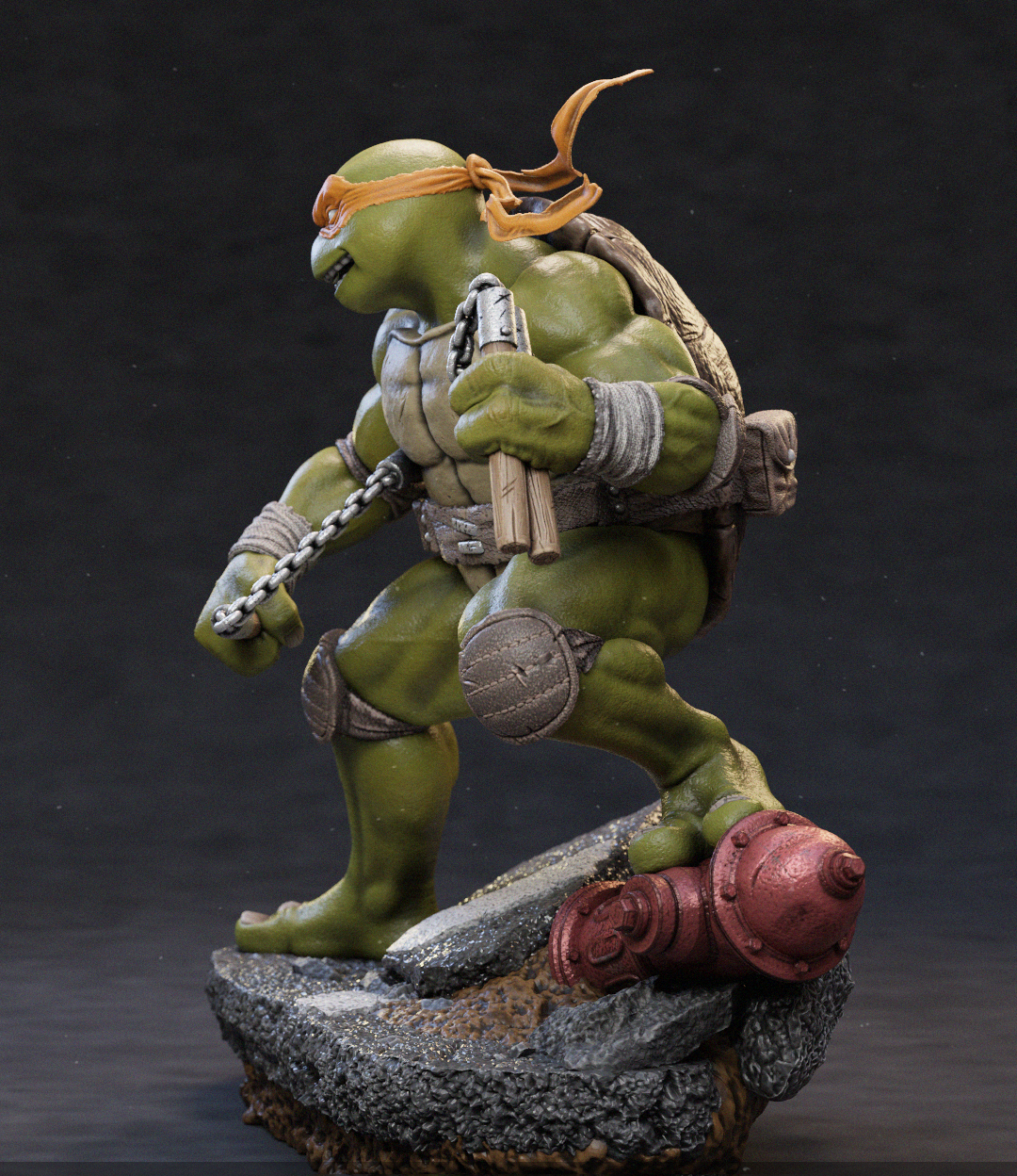 A detailed collectible statue of a green turtle character in a dynamic crouching pose, wearing an orange bandana and carrying a backpack, standing on a rocky base with a red cylindrical prop against a dark studio background.