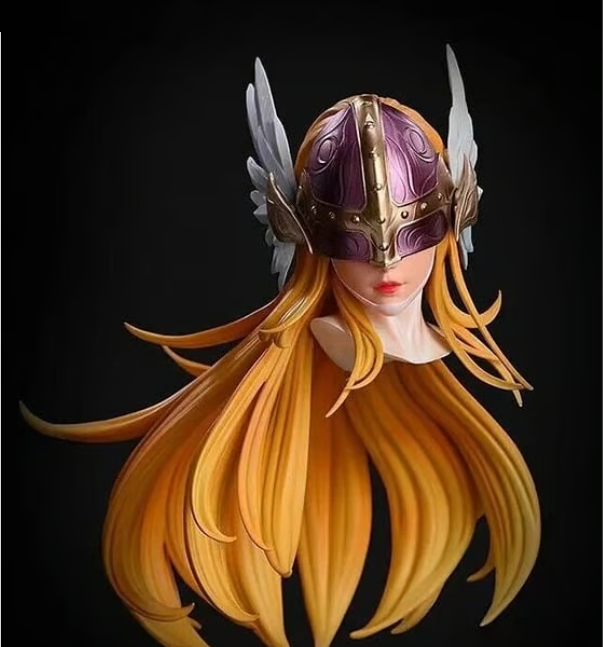 Figurine head with purple helmet and gold accents on a black background