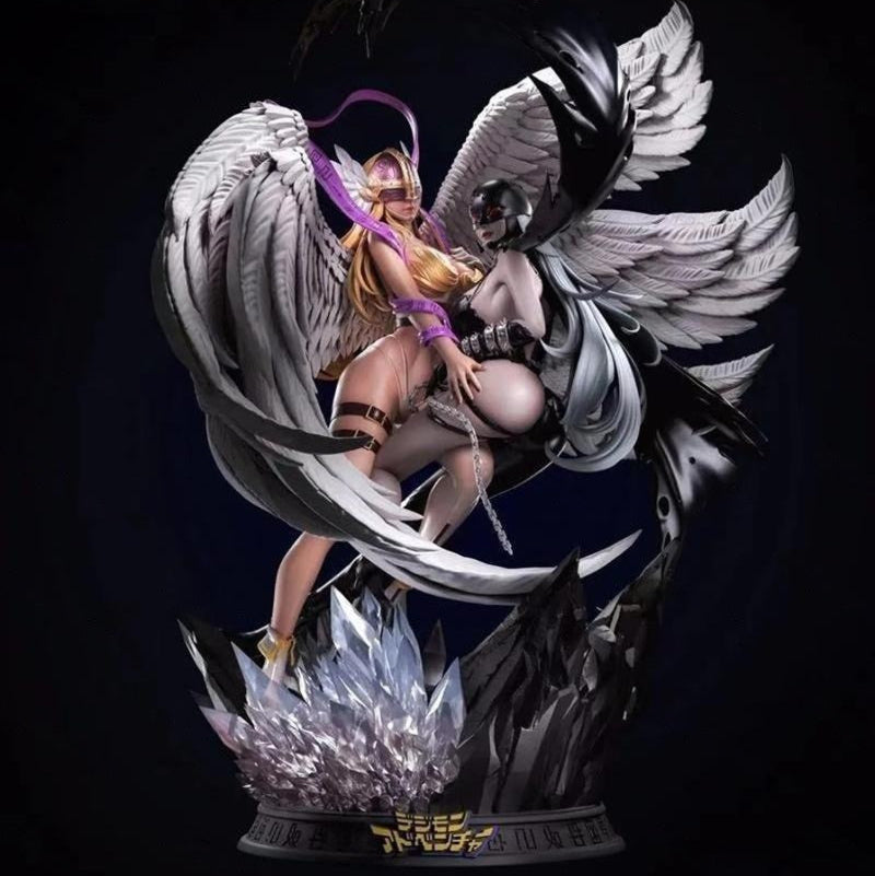 Statue of an angel and a demon with wings on a dark background