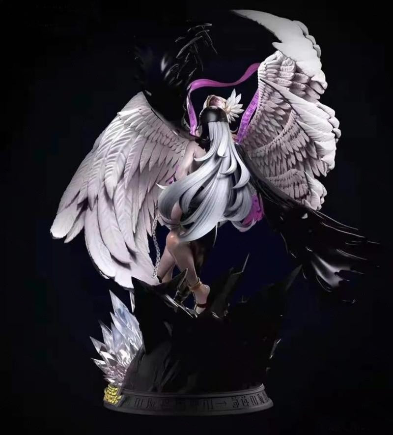 Statue of a character with large wings and a crystal-like base on a black background
