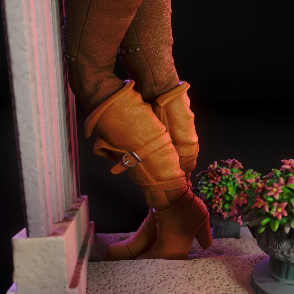 Brown leather boots with a buckle on a dark background