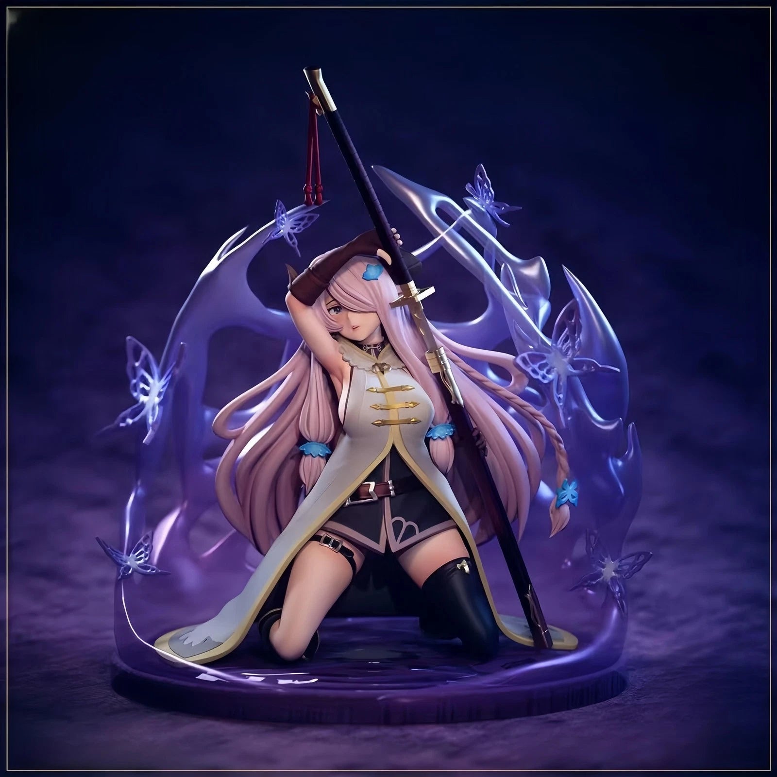 Figurine of a character with long hair and a sword, surrounded by butterflies on a dark background
