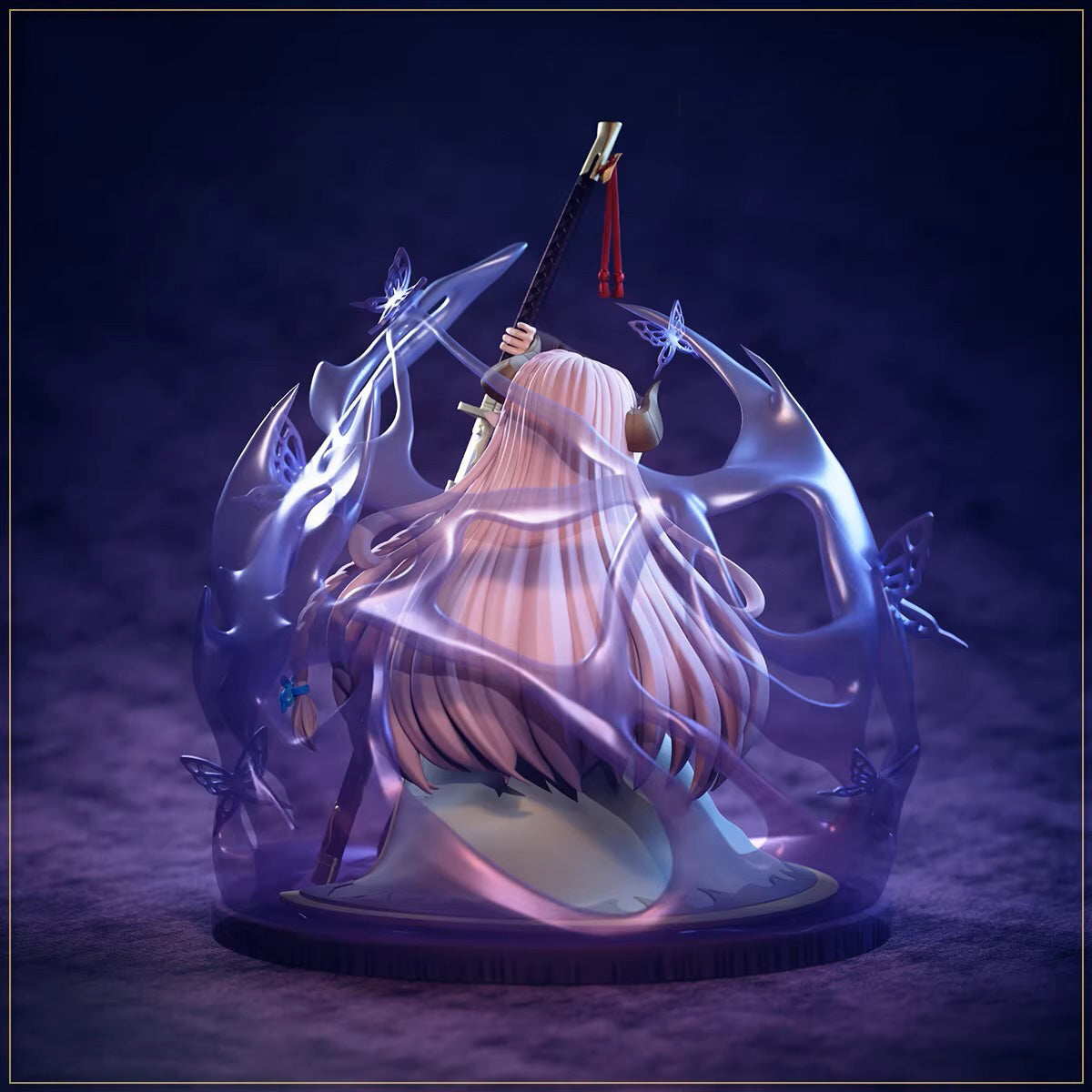 Statue of a character with a sword in a glass case on a dark background