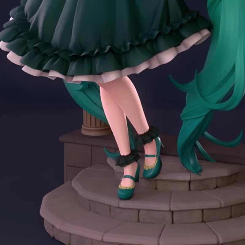 Close-up of Hatsune Miku figure with green dress and shoes on a dark background