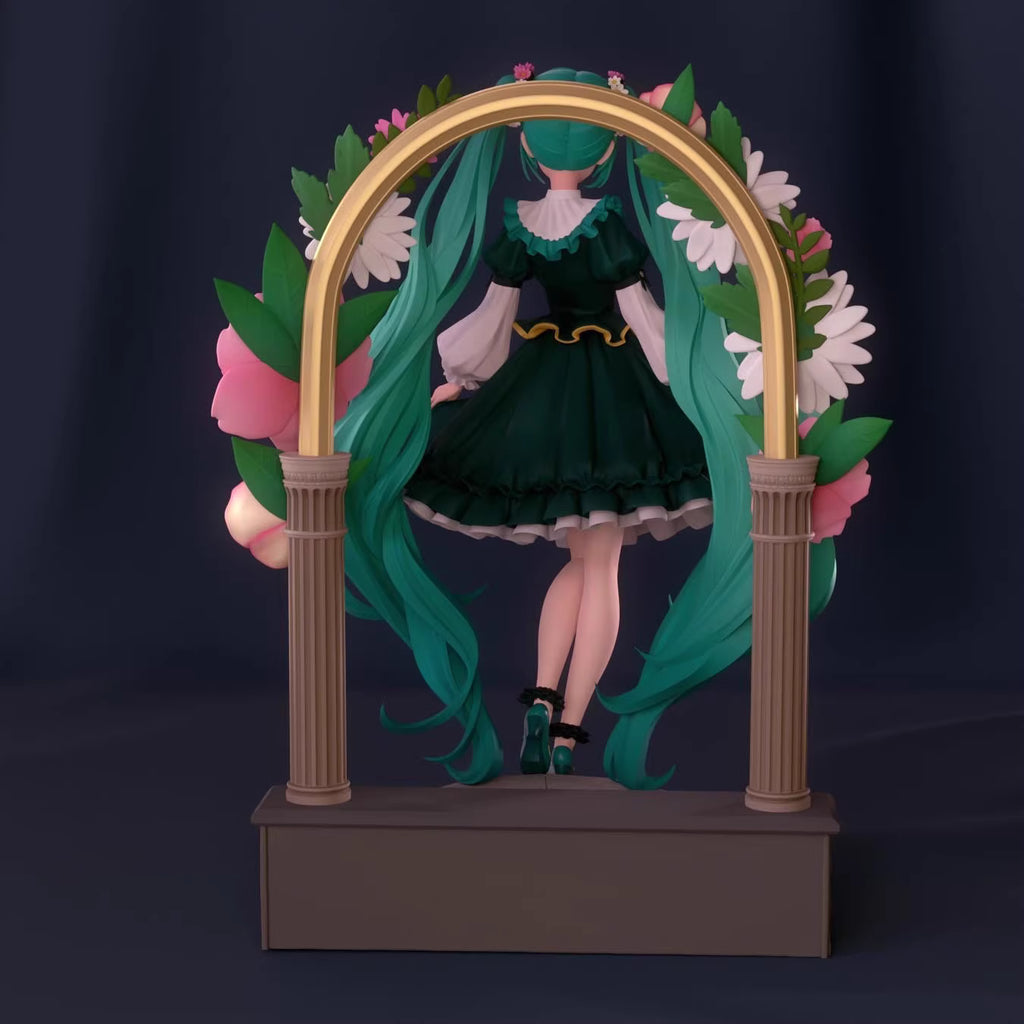 Figurine of Hatsune Miku with teal hair and green dress behind decorative archway on dark background