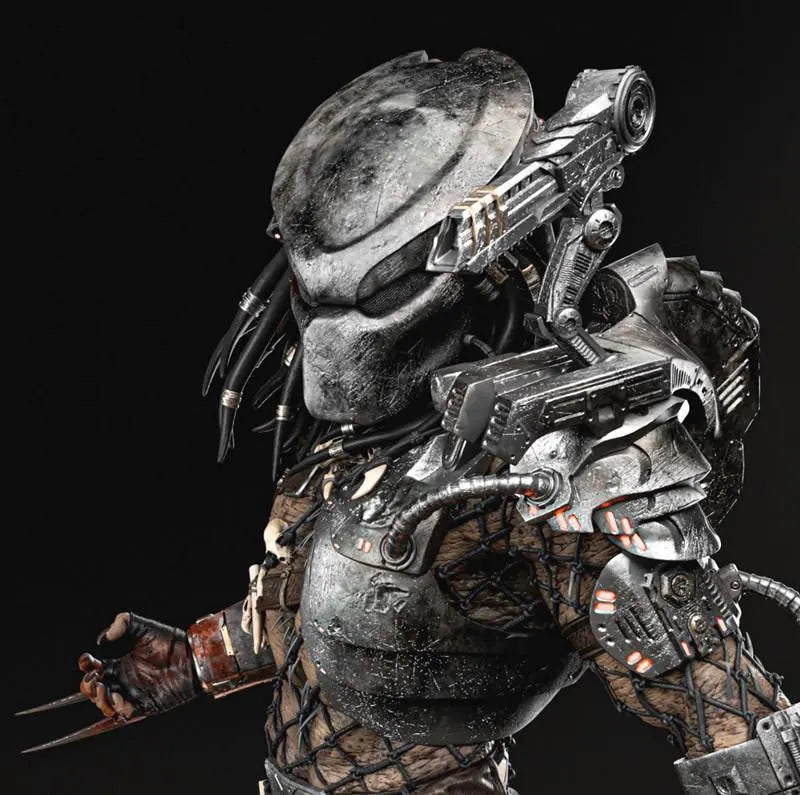 Close-up of a detailed Predator figure with a black background