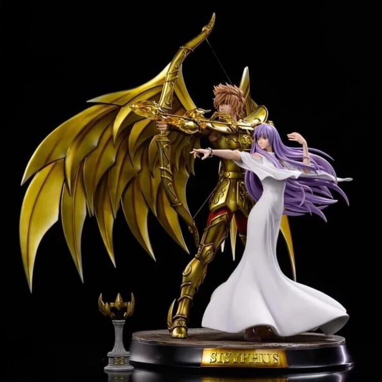 Two figurines on a black background, one in gold armor with a bow and the other in a white dress with purple hair.