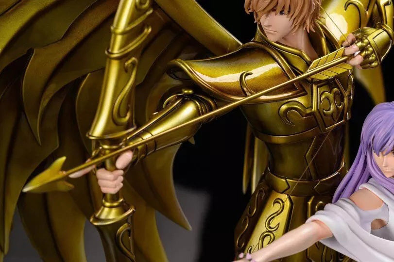 Gold armor figure with a weapon, surrounded by other characters, on a dark background