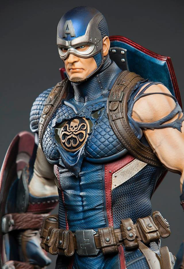 Superhero figurine with detailed costume and armor on a gray background