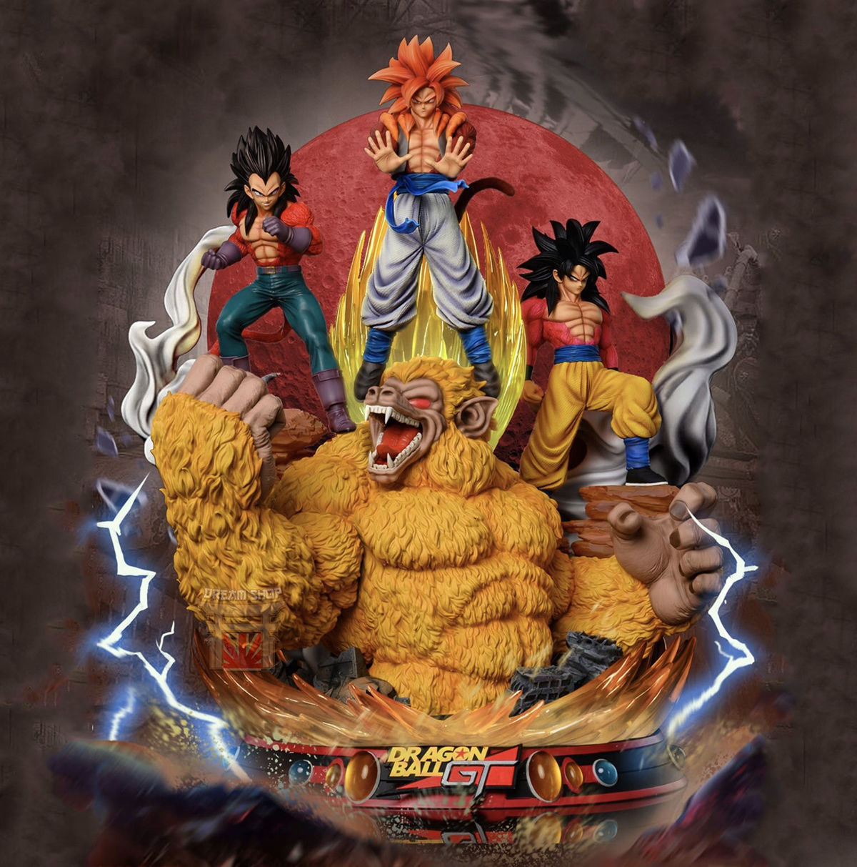 Dragon Ball Z figurine set with three characters and a large creature on a dark background
