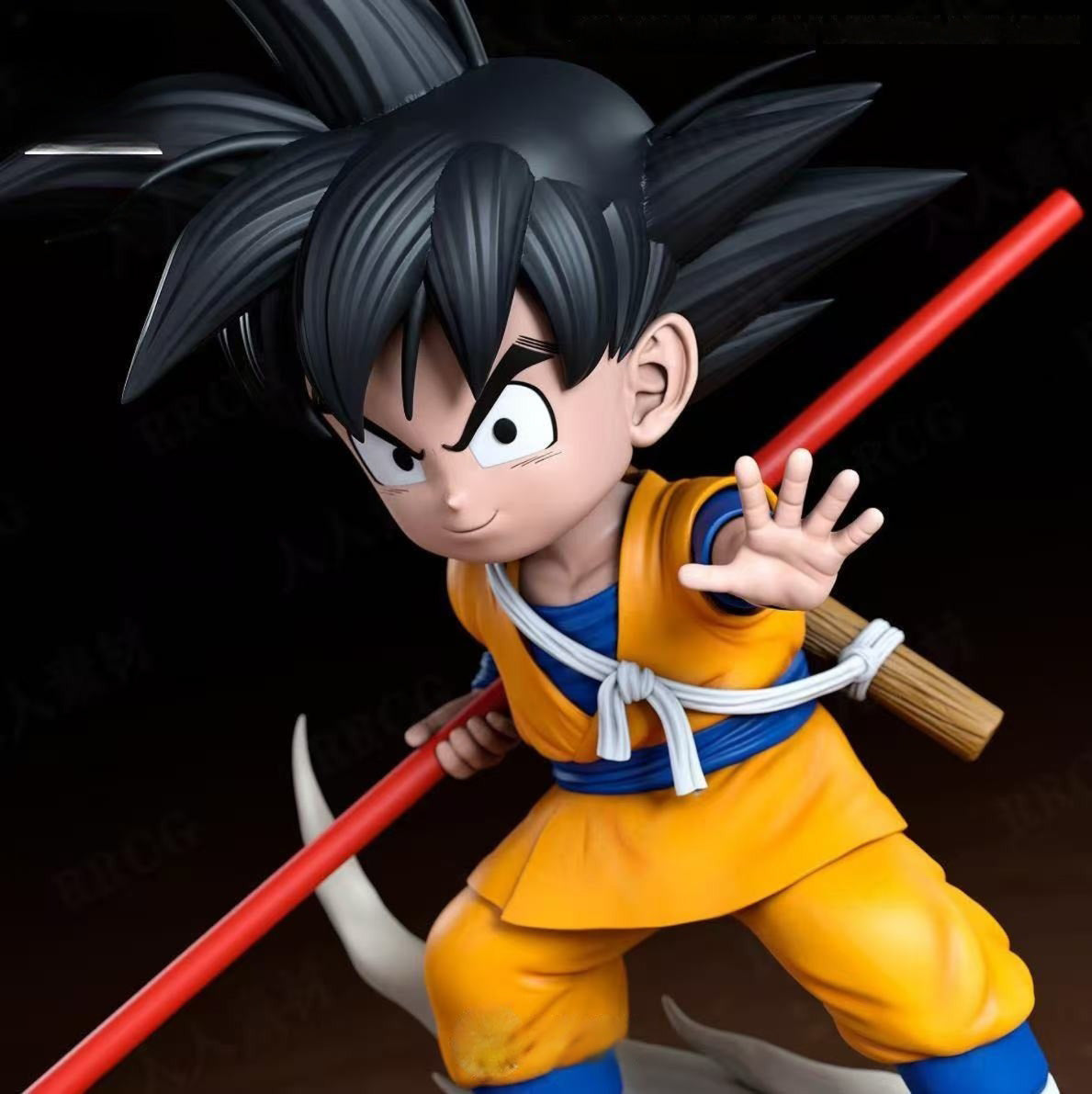 Animated character in orange and blue outfit holding a red weapon on a dark background