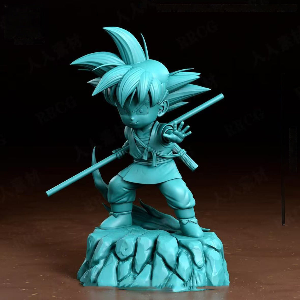 Turquoise figurine of a character with spiky hair and a staff on a dark background