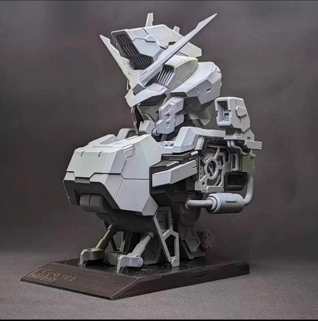 Mechanical model on a stand against a dark background