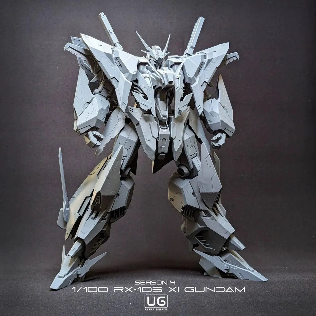 Model of a robot with 'UG' branding on a dark background