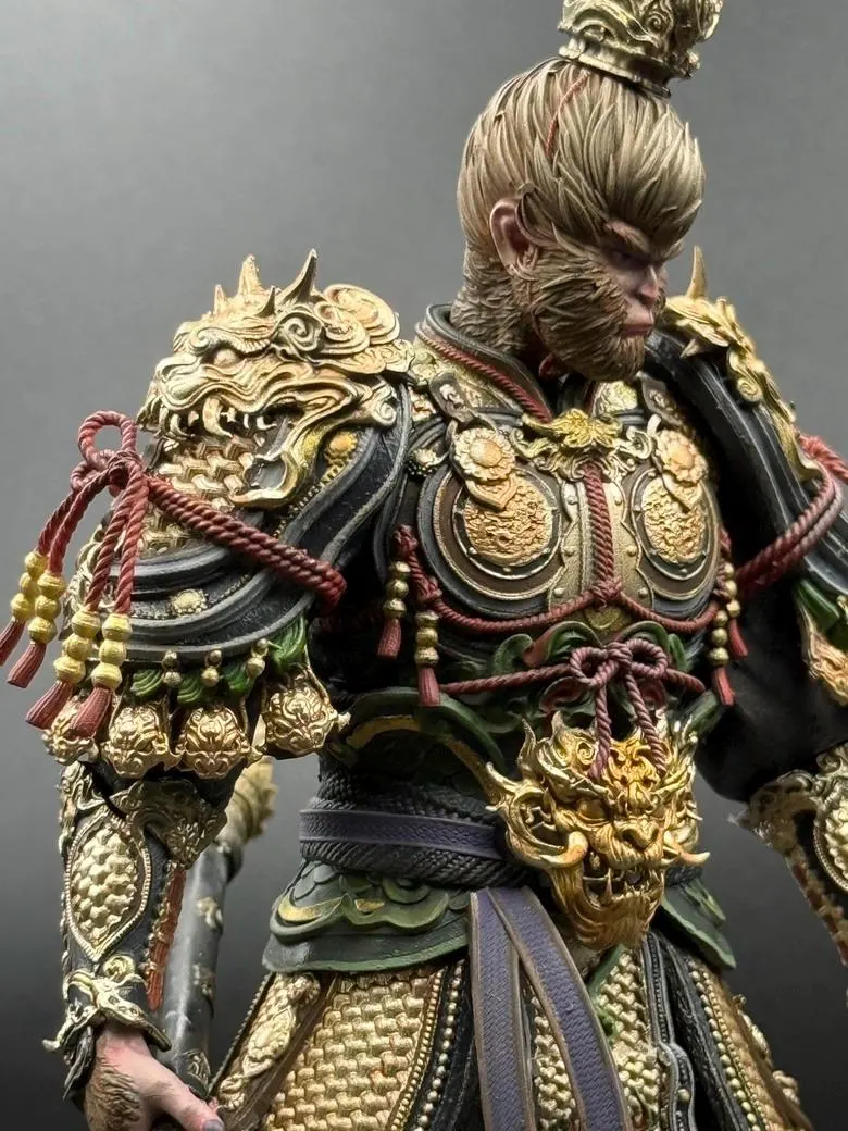 Detailed armor with gold and black design on a gray background