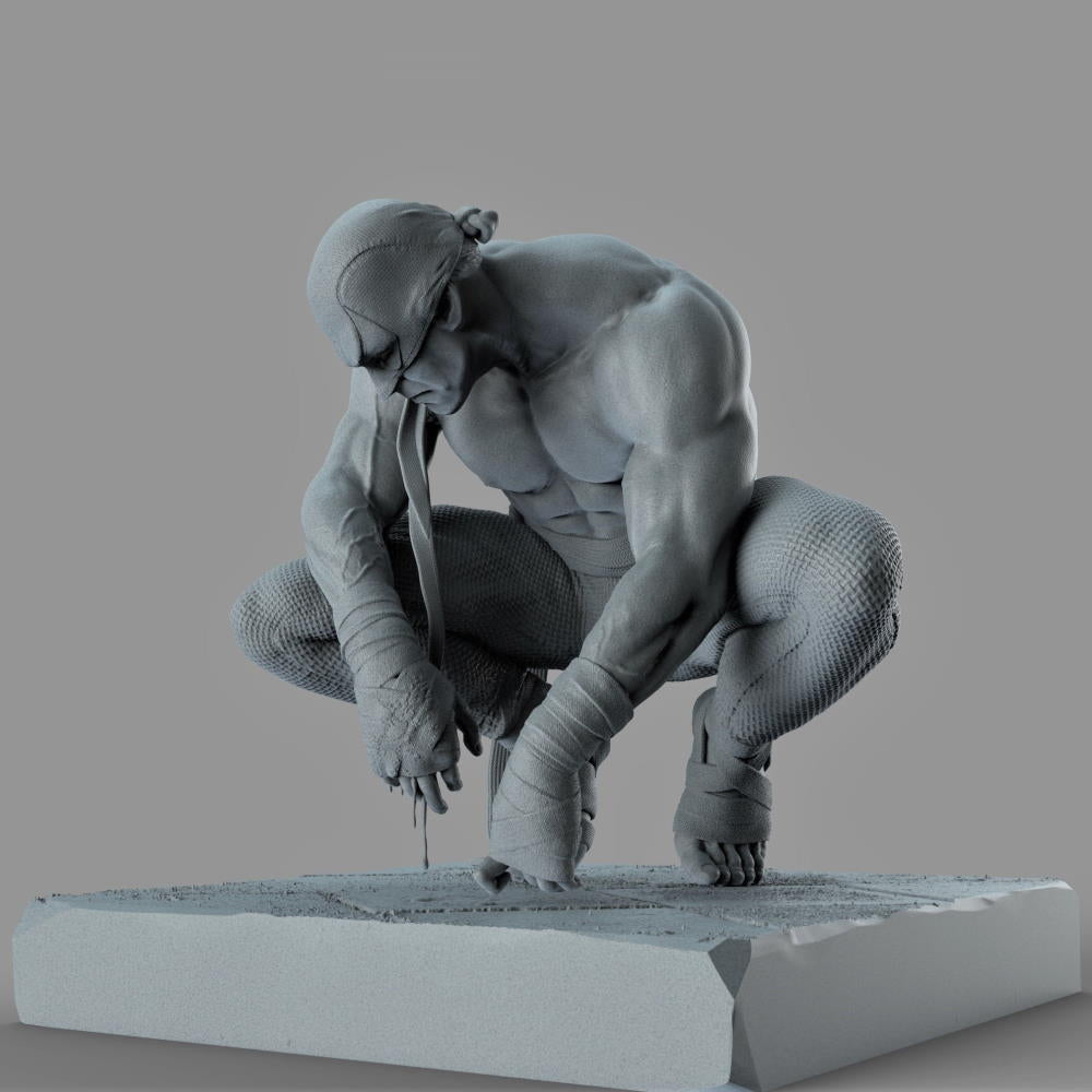 Gray statue of a muscular figure on a gray background