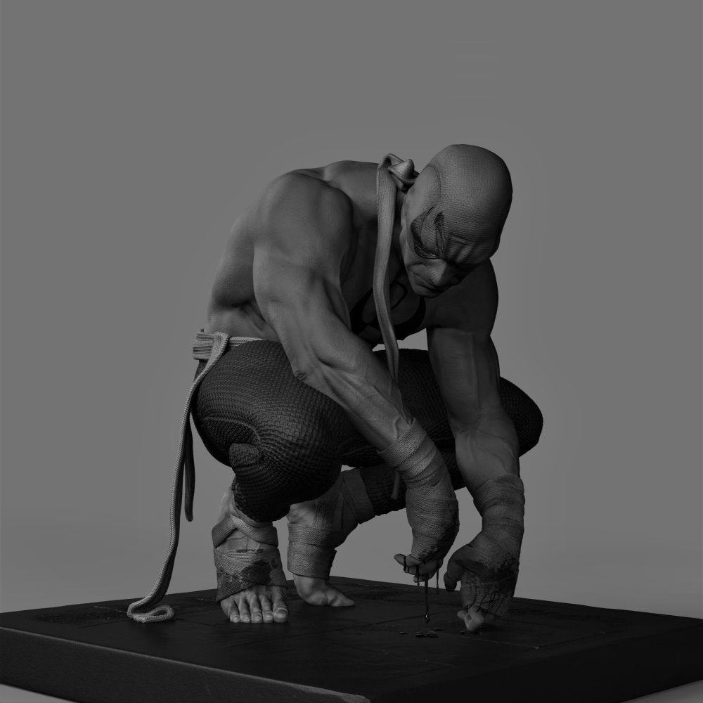 Black and white sculpture of a muscular figure with a snake on a gray background