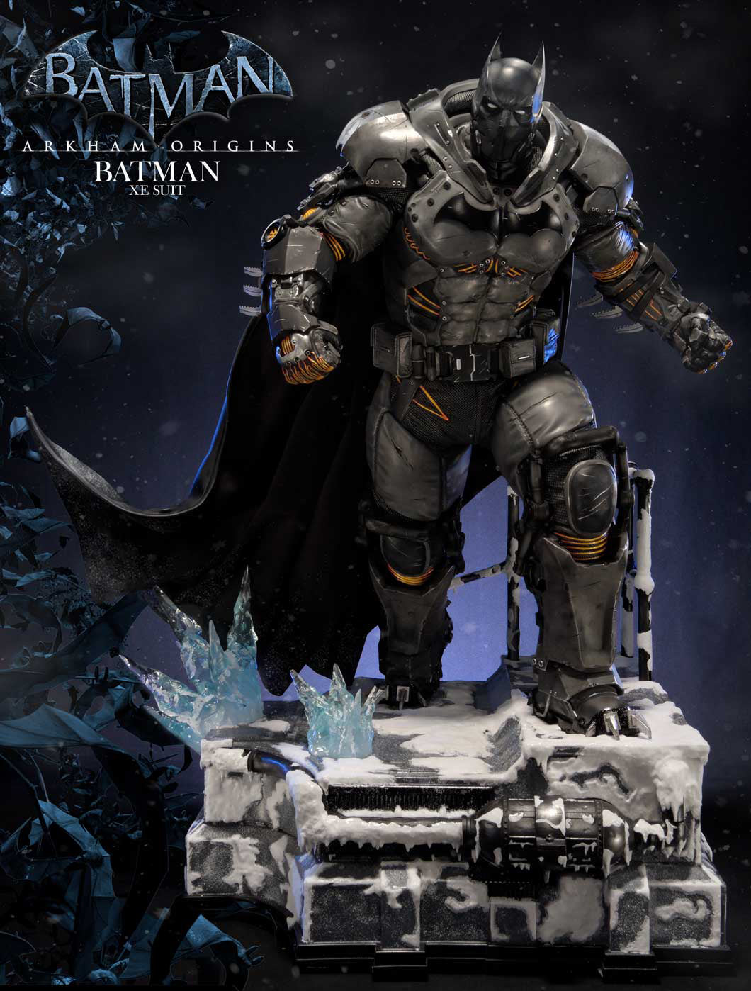 Batman Arkham Origins statue in detailed armored suit, standing on a snowy, battle-damaged base with a dark cape, in a dark icy scene with Batman logo text in the upper left.