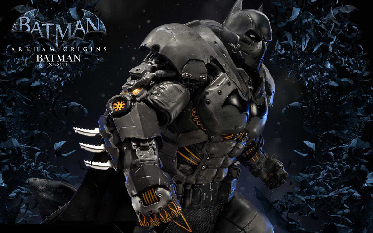 Batman in armored armor from Batman: Arkham Origins - Batman Arkham Game Pass, shown in a dynamic pose against a dark, debris-filled background. The image includes the official logo text in the upper left corner.