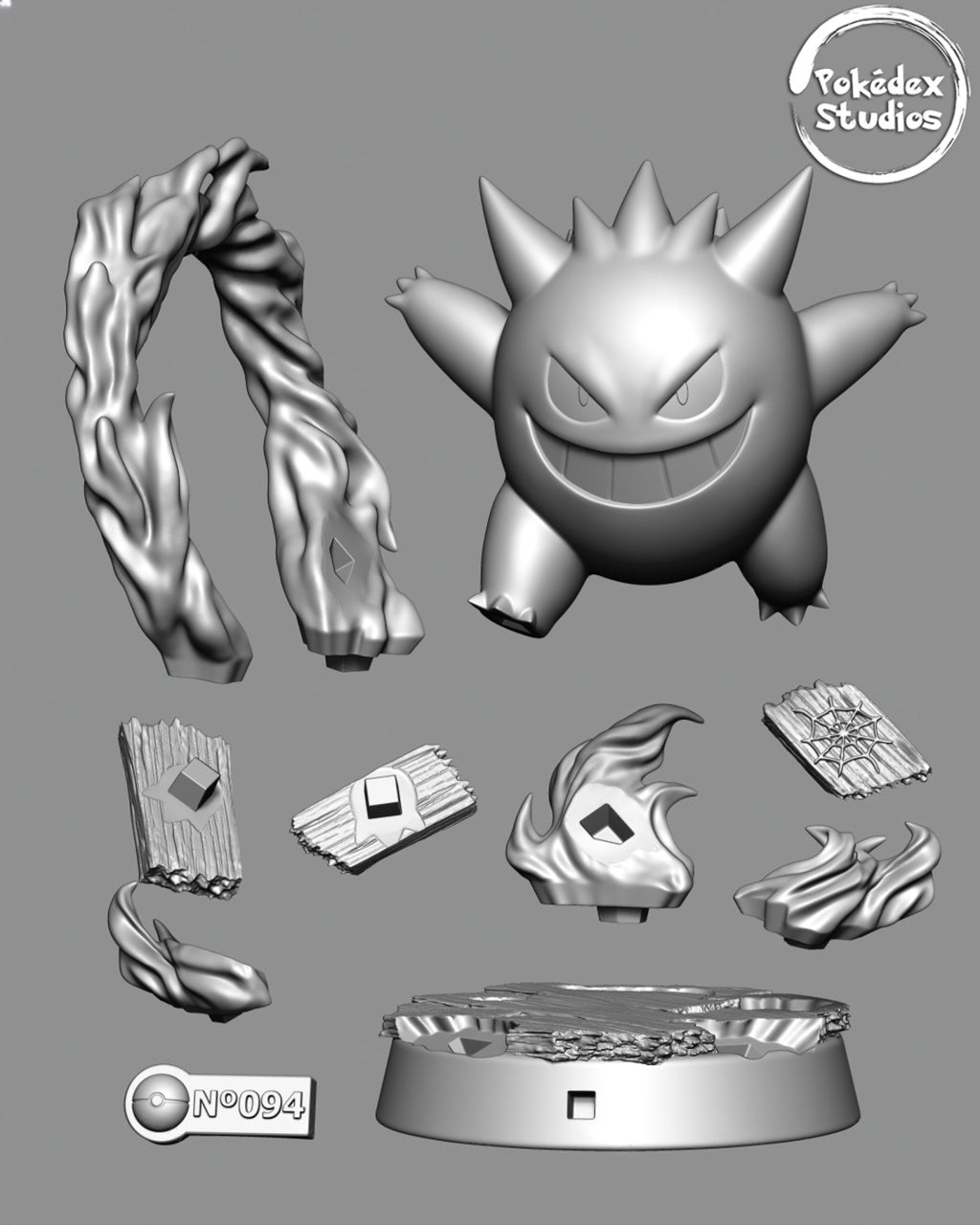 Pokémon Gengar model kit with various parts on a gray background