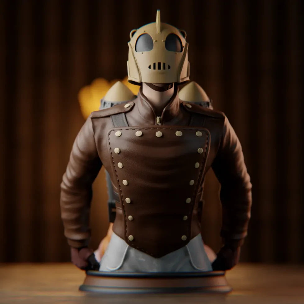 Statue of a character in a brown leather outfit with a helmet on a wooden surface.