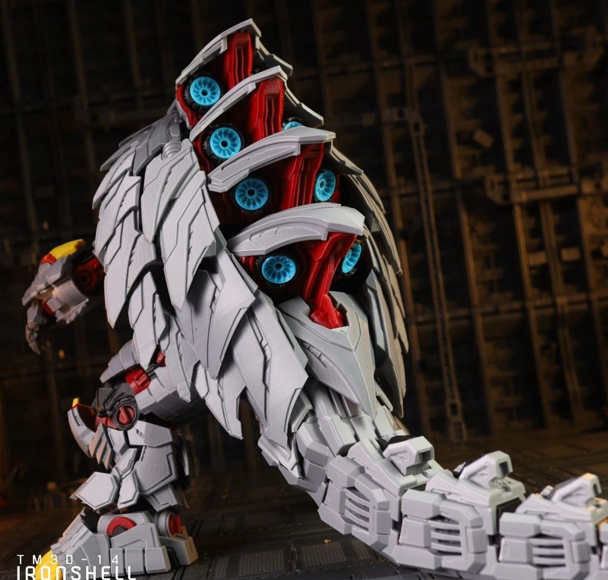 A highly detailed sci-fi mecha robot model, featuring a white and gray armored body with red mechanical accents and glowing blue circular elements on its back, set against a dark industrial background.