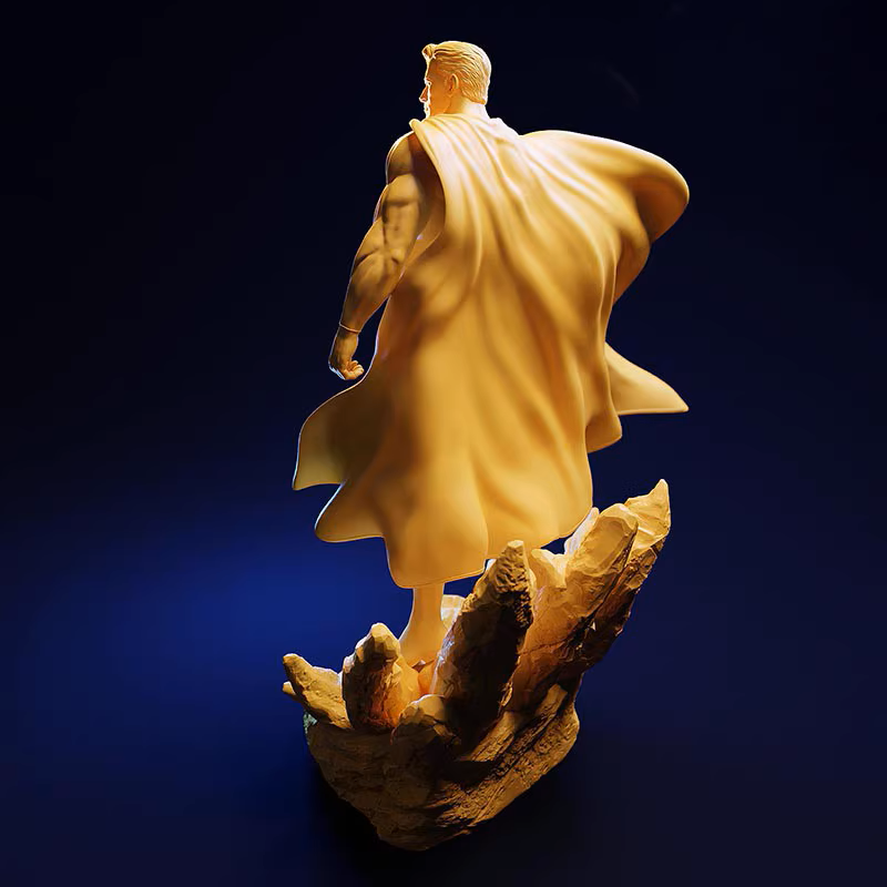 Statue of a figure with a cape on a dark blue background