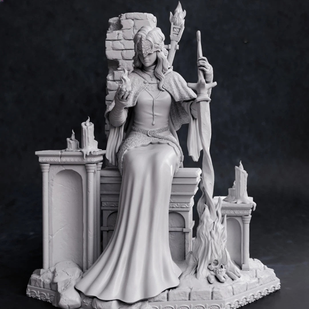Statue of a figure in regal attire sitting on a throne with architectural elements.
